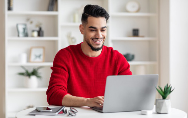 A student completing a university assignment